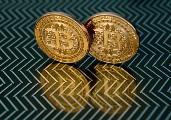 比特幣是什么？請通俗的解釋一下講一下它的歷史